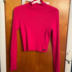 pink turtleneck crop top